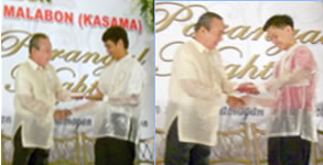 Aldrin and Ronald receive awards from Malabon City Mayor.