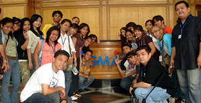 Students Pose behind GMA-7 Lobby.