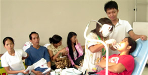 Sir Jeff interprets for the deaf dental patient.