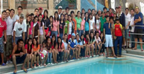 Group Photo behind the pool