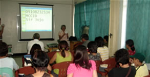 Parents listen to Maam Remedios Esposa, School Registrar.