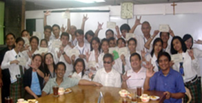 Students make 143 sign with Dir Matt Lee, Ma\'am Nelia and MCCID faculty at NCDA Board Room.