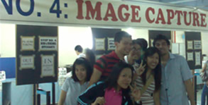 Student pose behind the NBI Photo Lane.