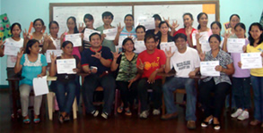 Participants in Sign Language Training in Puerto Princesa City, Palawan pose their I-L-Y Sign.