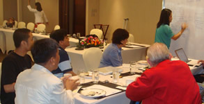 Liliane Foundation's Tess Dela Cruz writes down the group's inputs.