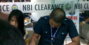Students fill up NBI clearance application form.