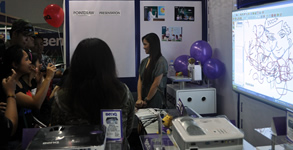 Students try out a laser drawing tool called PointDraw.