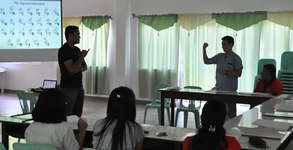Sir Jerome reads a fingerspelled name of a participant.